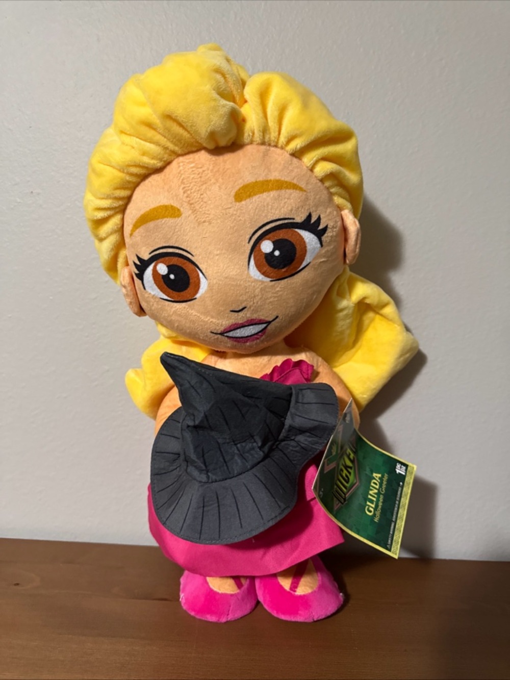 Wicked Galinda 18” bendable doll holding elpheba’s black hat